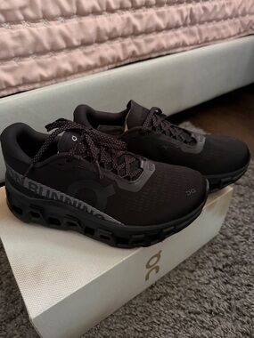 On Running Black Lace-Up Cloudmonster Sneakers with Tan Tongue Accent